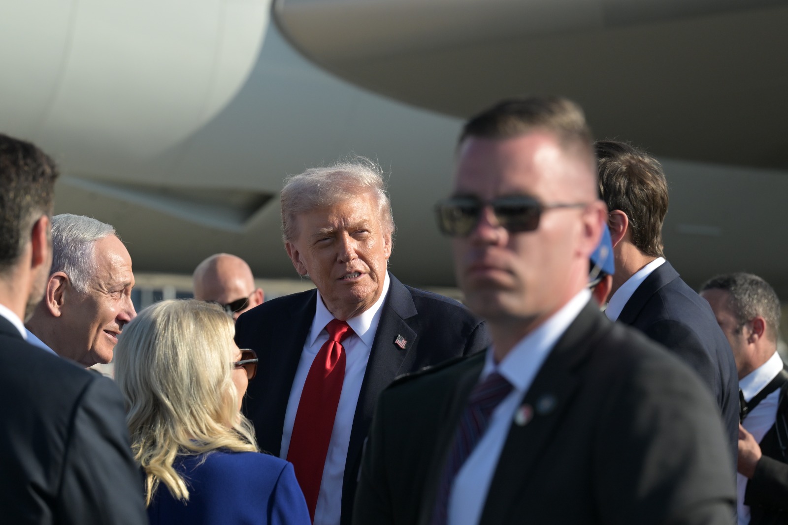 Trump with Prime Minister Benjamin Netanyahu and Sara Netanyahu on the tarmac at Ben Gurion